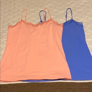 Two lace trimmed Camisoles